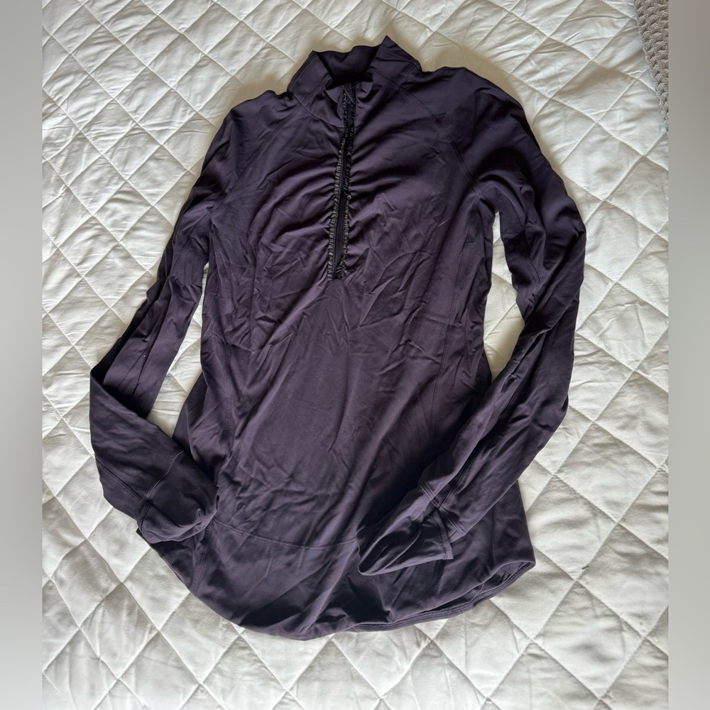 Lululemon quarter zip. Size 8 color purple